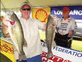 Lee Byrd placed second fishing three to four feet of water with a white frog and a black/blue jig.
