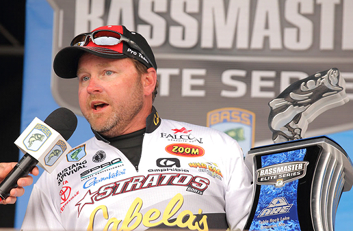 Mike McClelland of Bella Vista, Ark., takes first place at the A.R.E. Truck Caps Bassmaster Elite at Table Rock Lake. With his win, McClelland earns a berth in the 2015 Bassmaster Classic.  Photo by Seigo Saito/Bassmaster