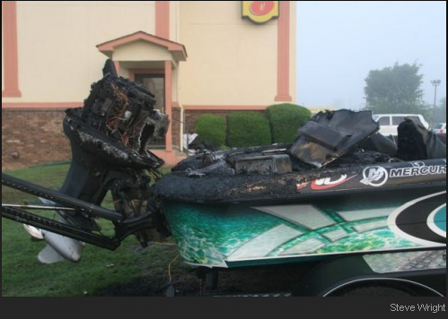 Chris Lane awoke to news that his boat was on fire. The boat was a total loss.