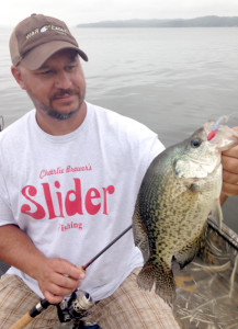 Brad Whitehead shows one of the crappie caught on a funky monkey-colored Slider Lures Crappie Grub. COURTESY PHOTO